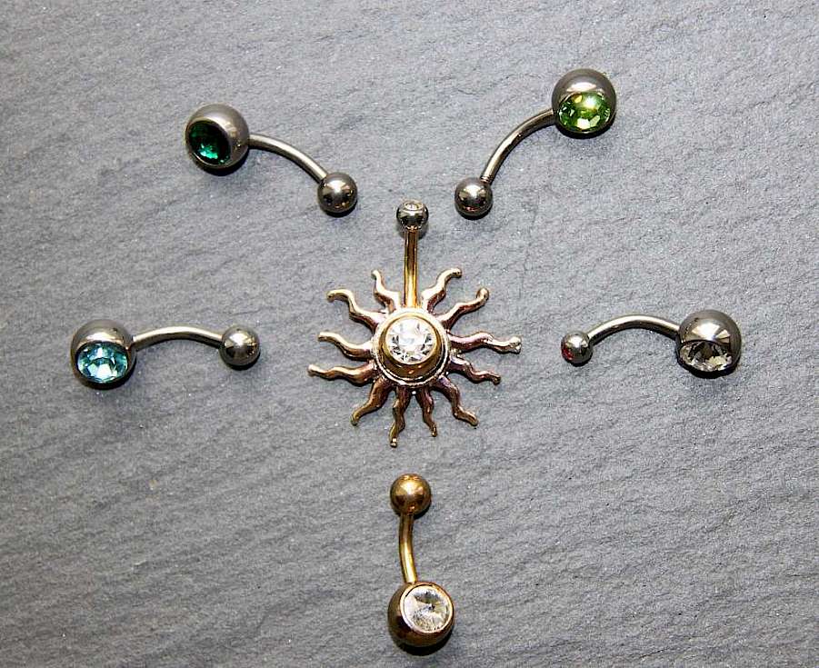 Piercingschmuck Bauchnabelstecker mit Sonne Bild Fragen und Antworten