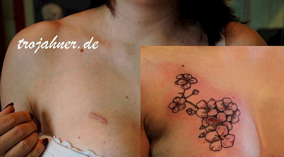 Bild Kirschblüten Narbentattoo über Narbe Tattoo