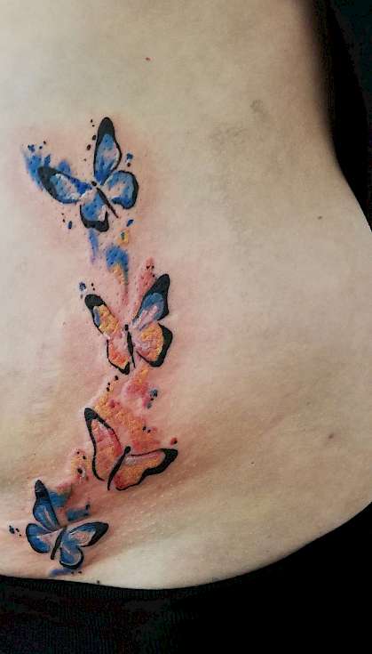 Bild Abstrakt Schmetterlinge Leisten Tattoo farbig